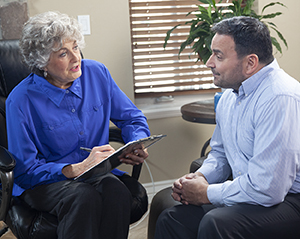 Man talking to therapist.